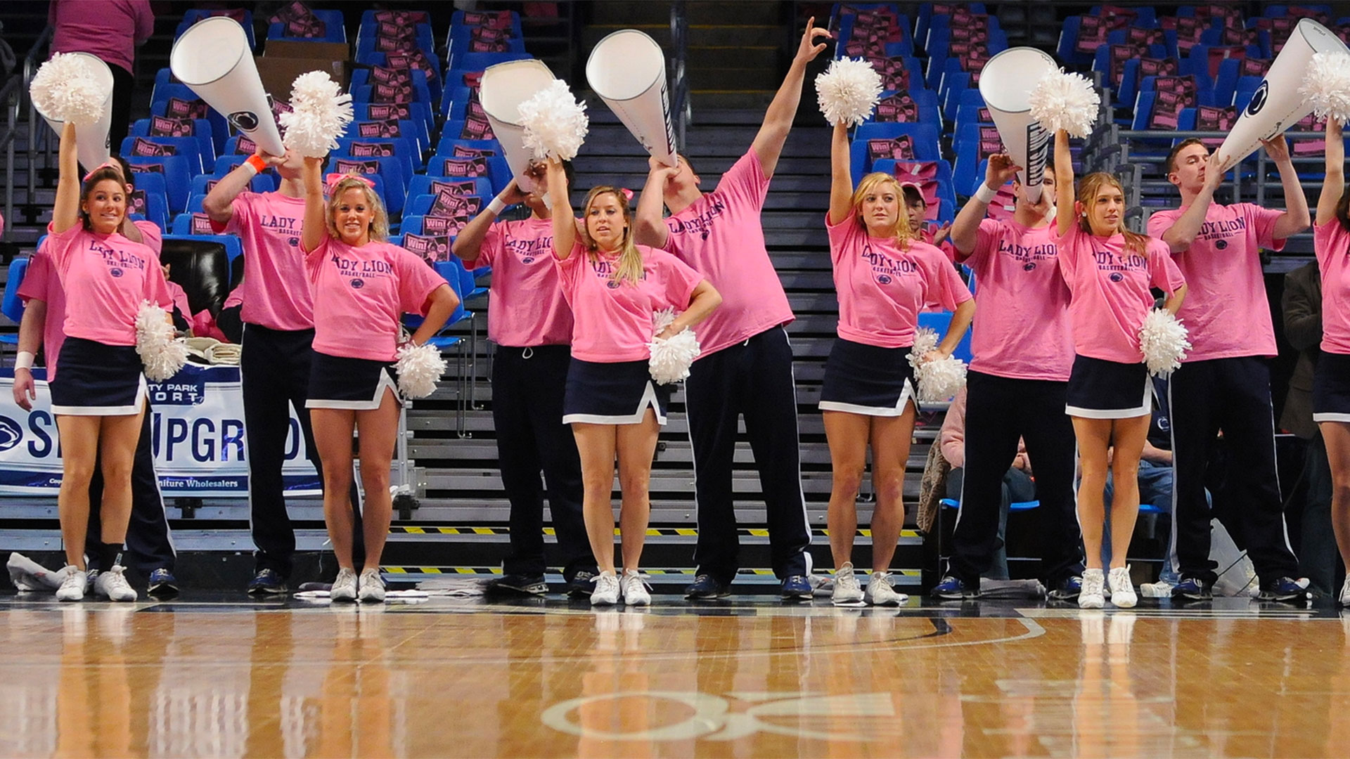 Penn State cheerleaders dressed in pink
