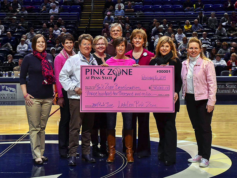 Pink Zone check presentation showing impact on our community